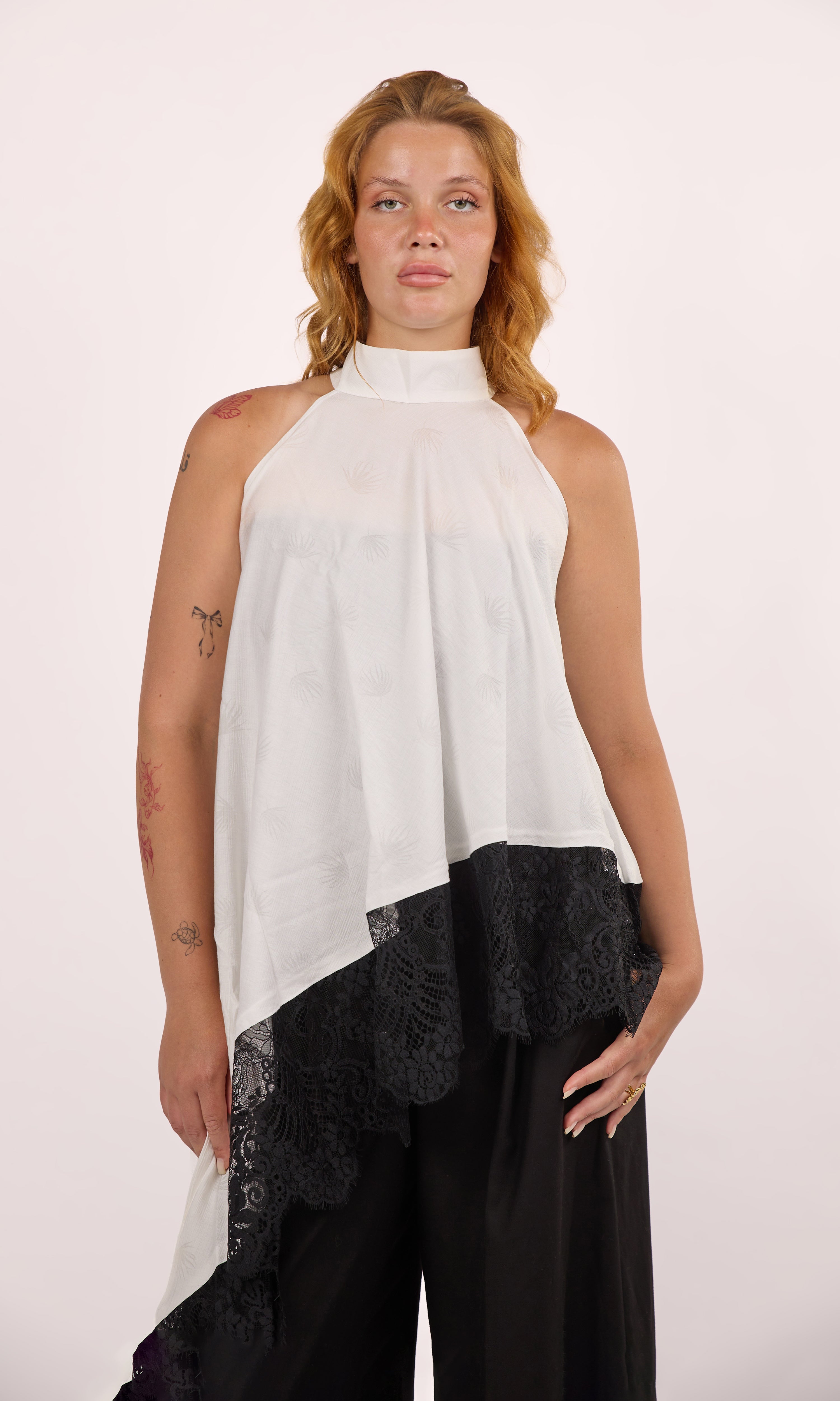 Asymmetrical white lace top